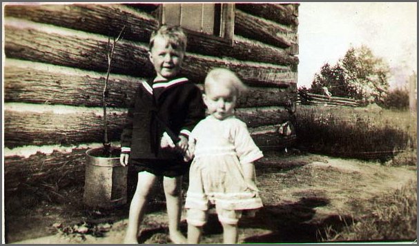 Fred_Georgie_at_cabin_by_Wolfe_Lake.jpg